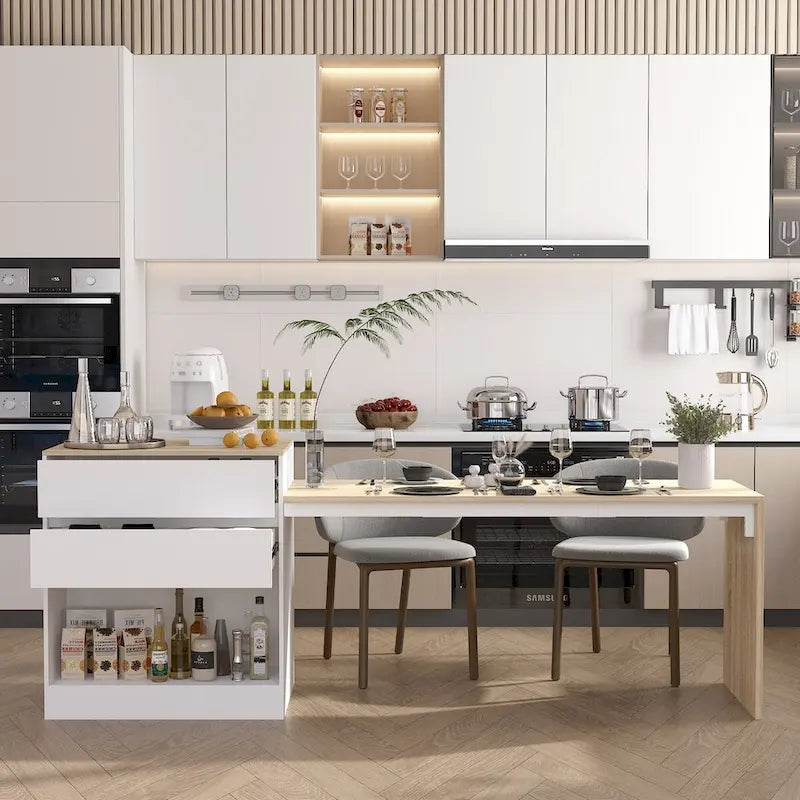 Grand îlot de cuisine en bois blanc avec tiroirs de rangement et table à manger